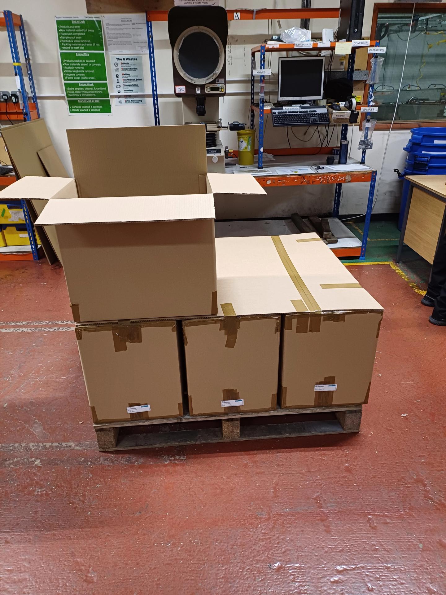 The photo shows the product being boxed for dispatch.
