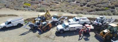 D&S septic trucks and excavation equipment lined up for service