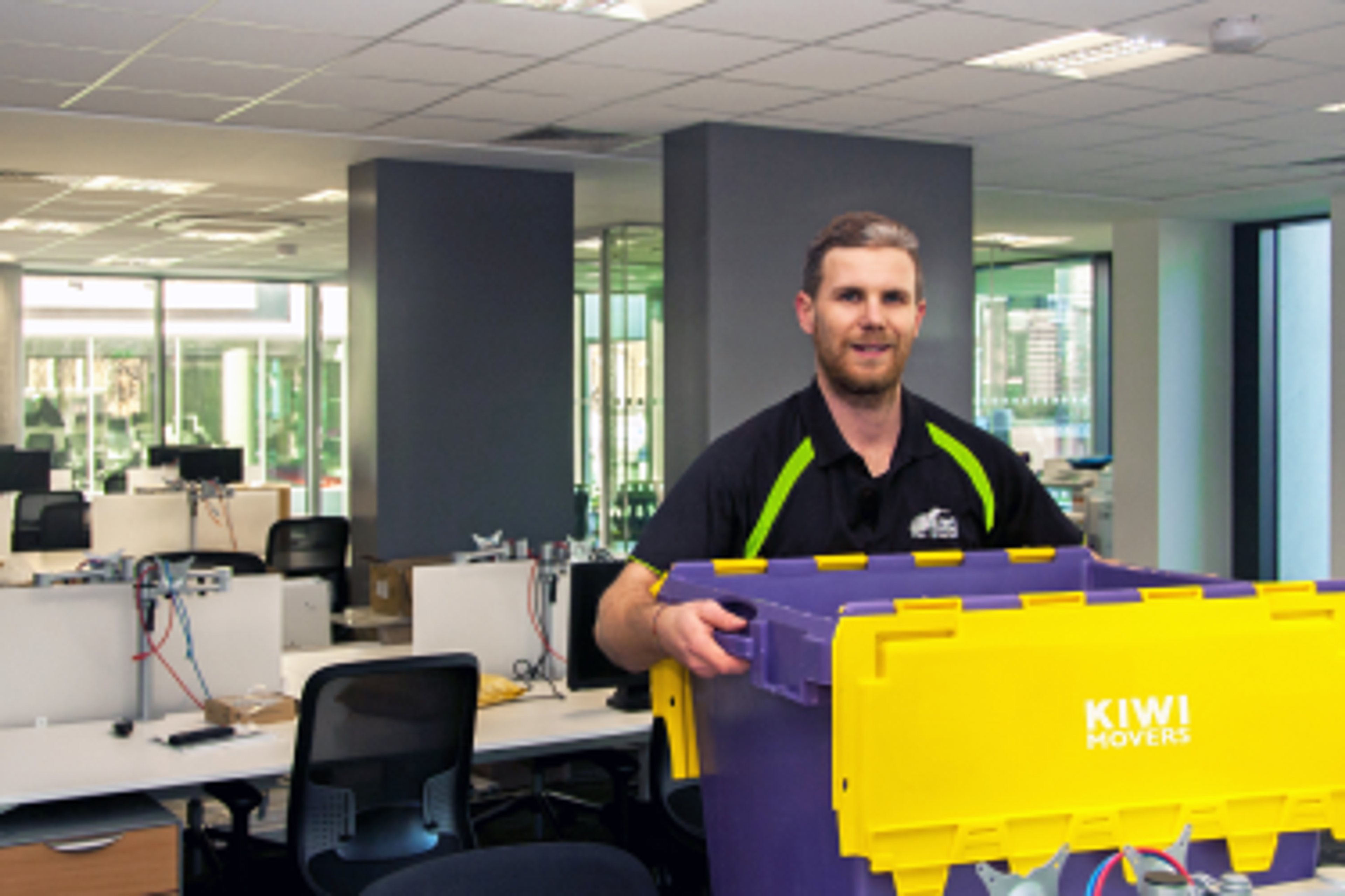 man carrying a box
