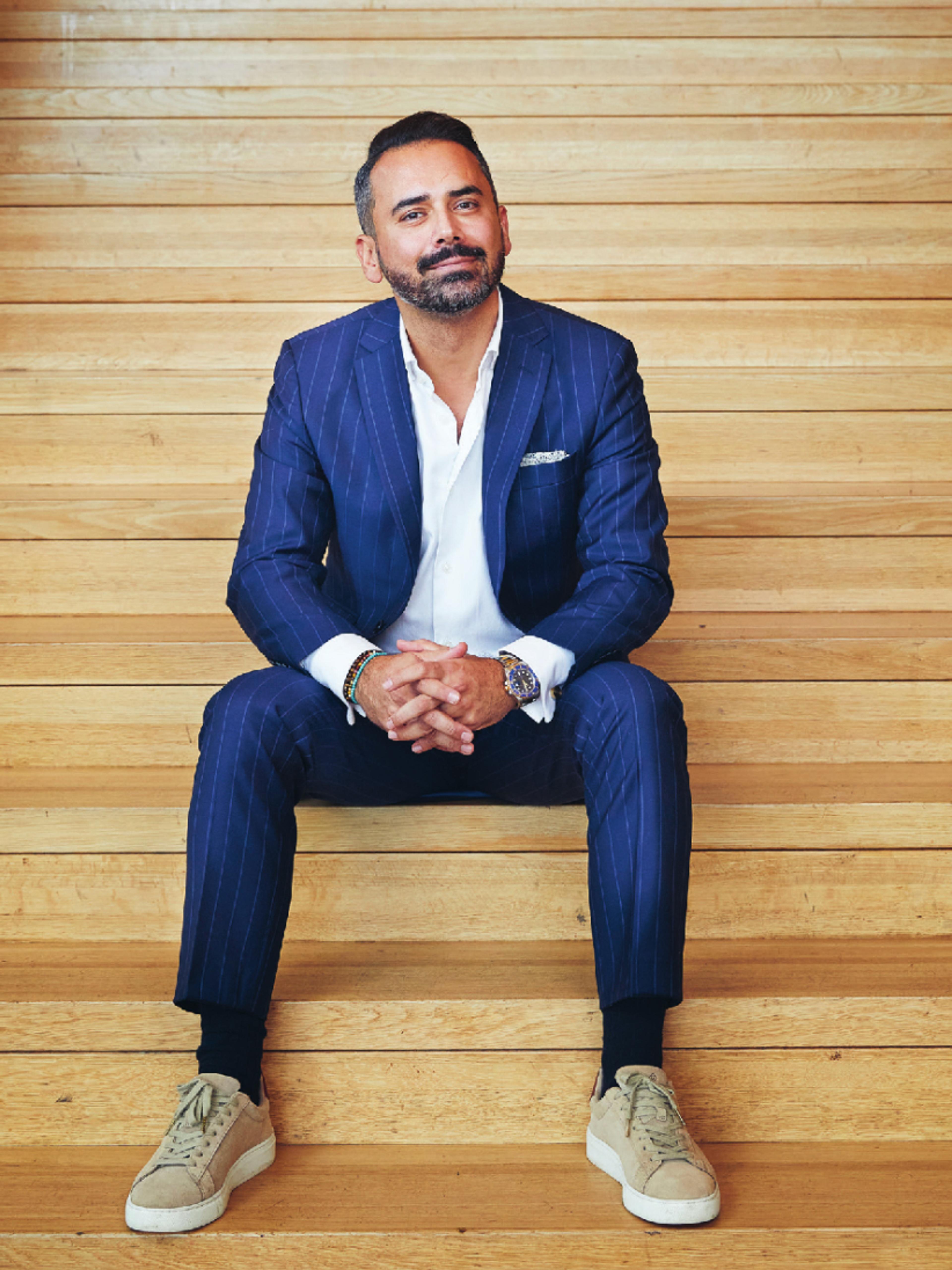 Ali Amini sitting in a stair