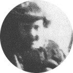 Young girl in a dark dress.