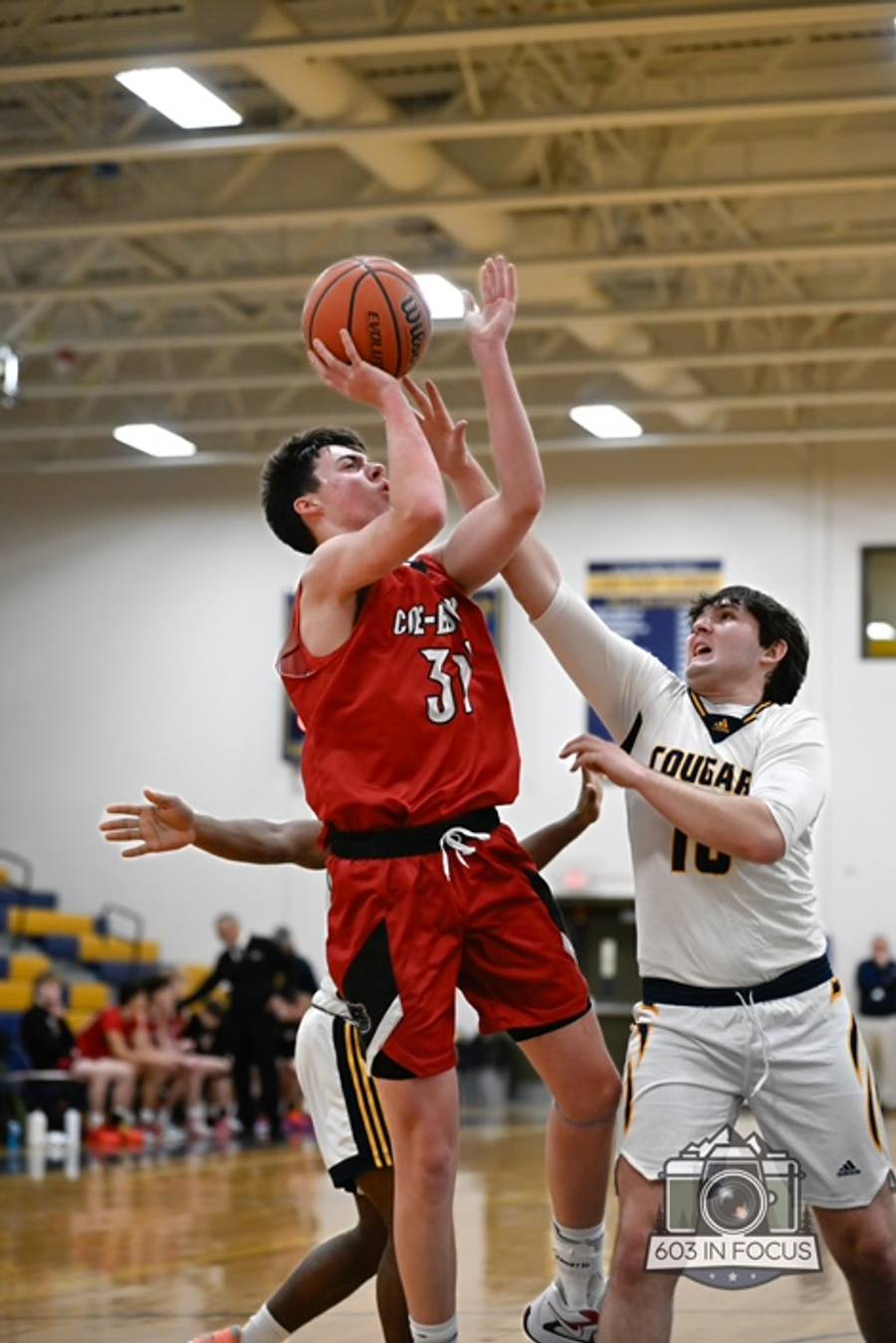 High school basketball action