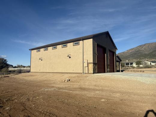 Side view of the completed Legend Hills RV garage and tall vehicle bays