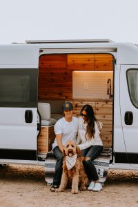 Campervan couple with dog