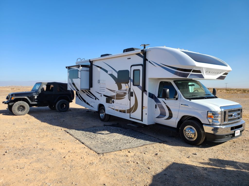 Class C RV and tow vehicle