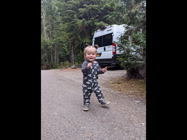 Child in front of campervan