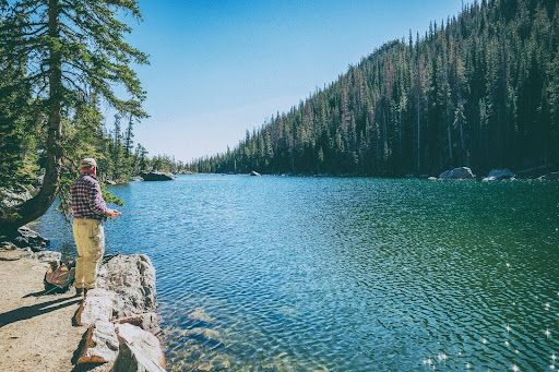 Man fishing on a river