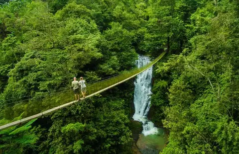 Waterfall and suspension bridge in Manuel Antonio, Costa Rica
