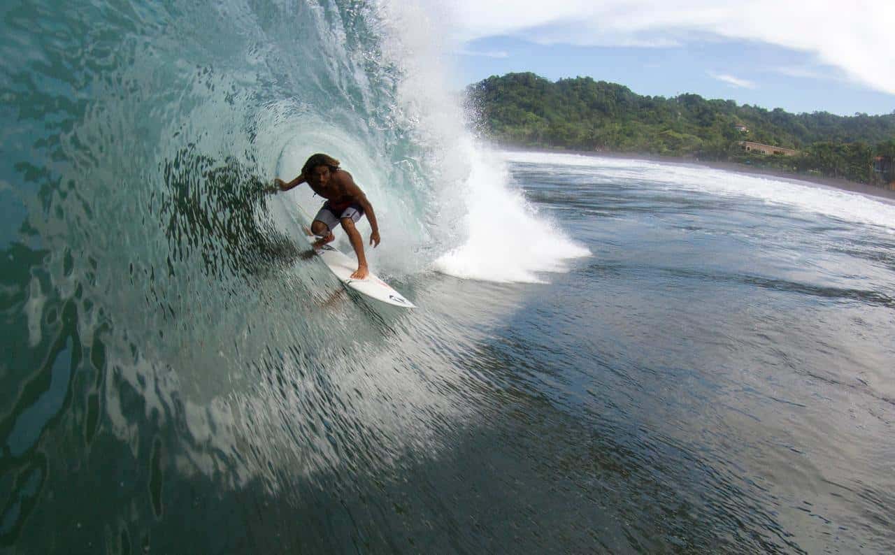 Surfing at Playa Jacó