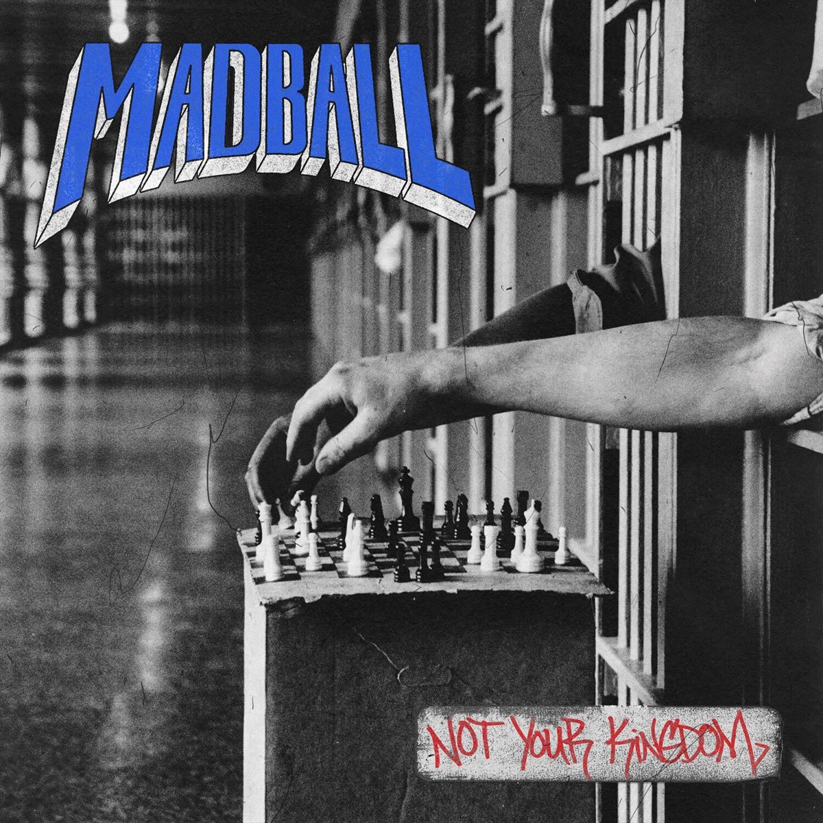Album artwork for Madball's Not Your Kingdom showing a black-and-white crowd scene with red title text