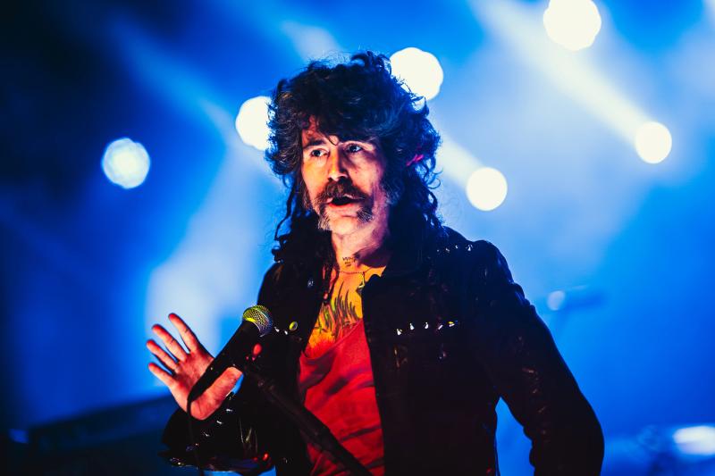 AFI on stage with vibrant colored lighting