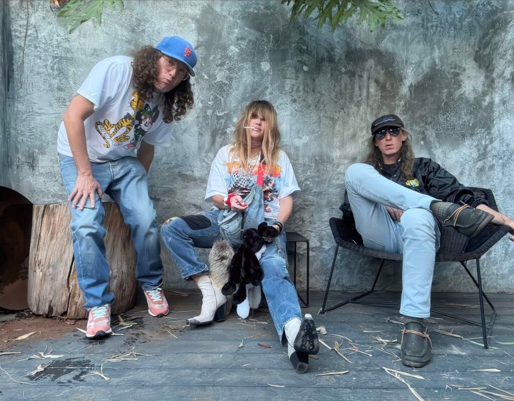 Black Bananas pose together in a color band photo for their Fire Records era.