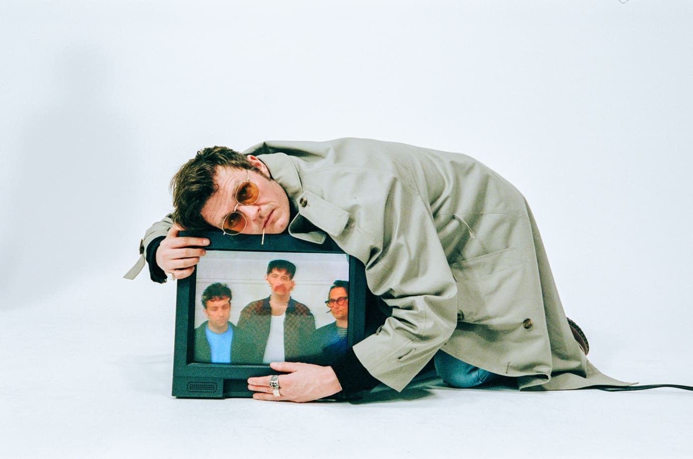 Yard Act posing together in a band photo