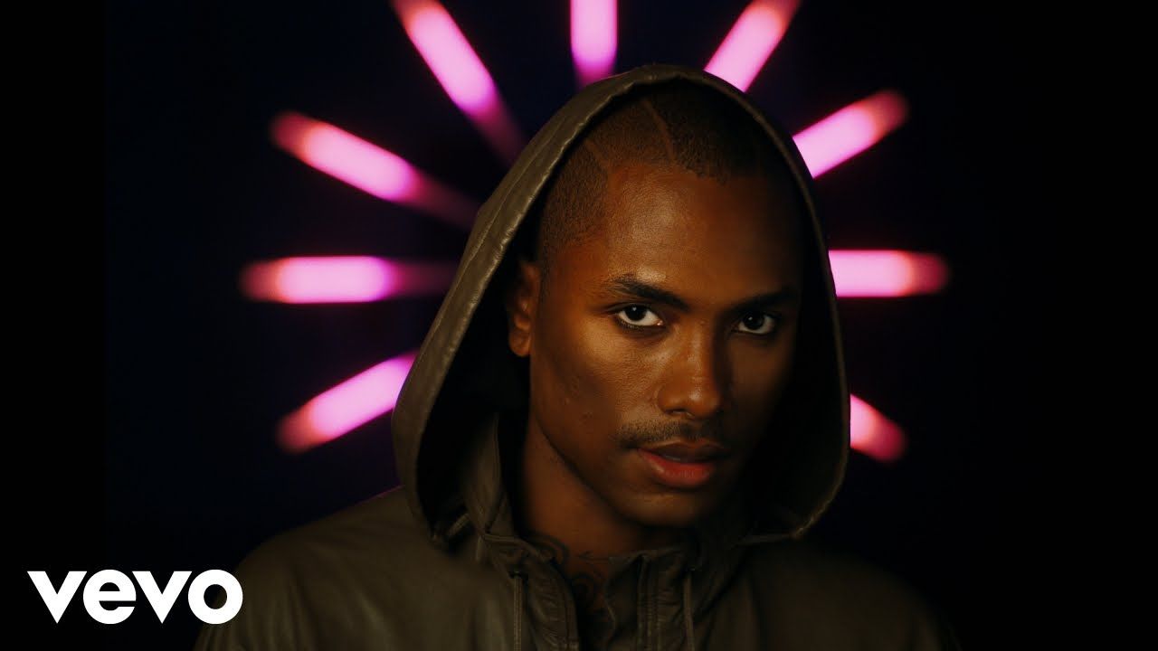 Steve Lacy framed in blue light in the official video for 'the feeling.'