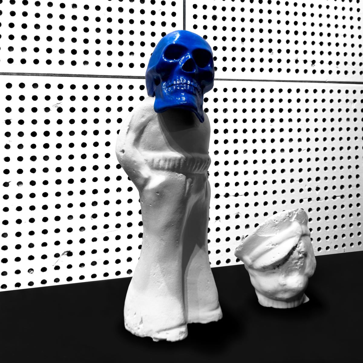 Jack White Frozen Charlotte album artwork showing a blue skeletal figure on a dark background.