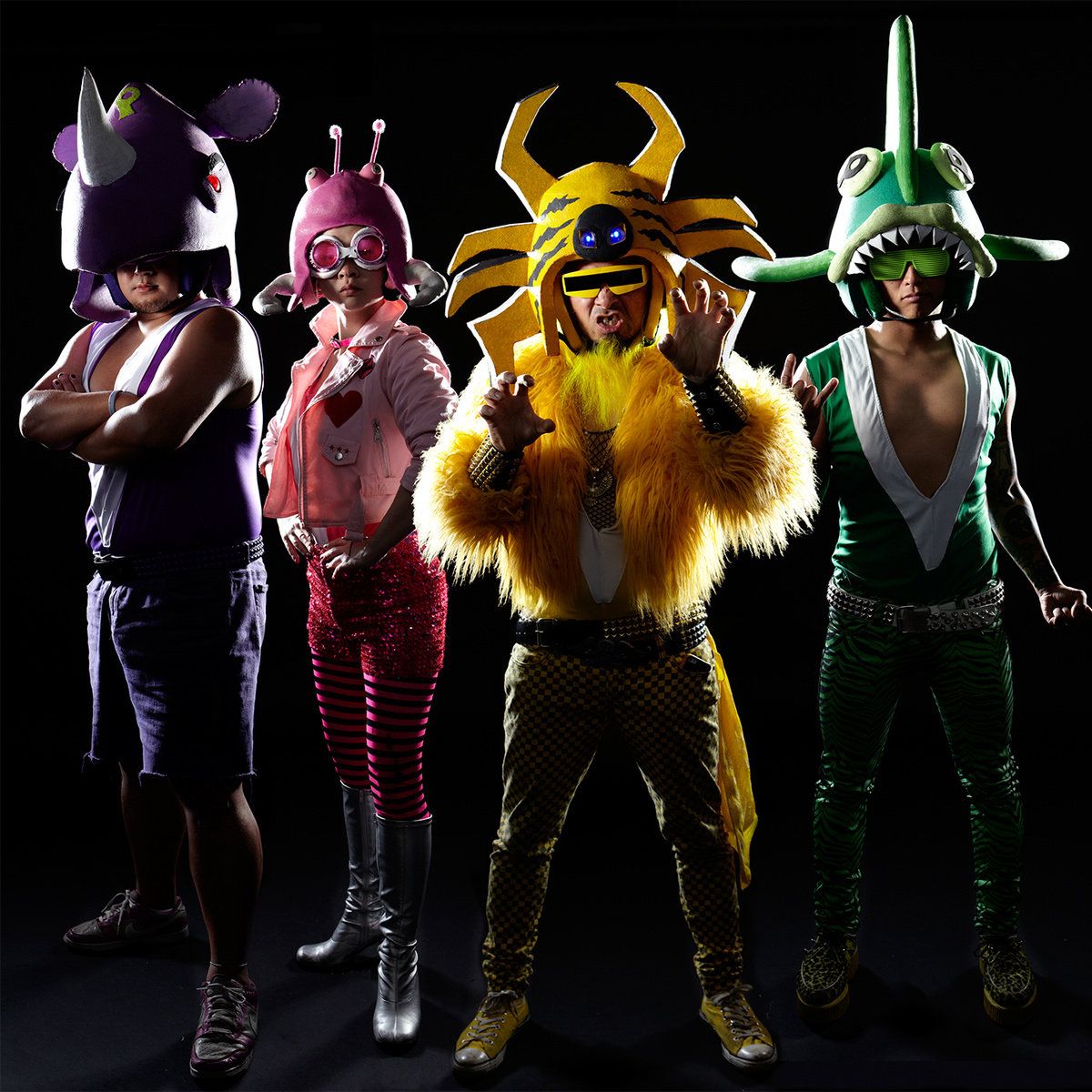Peelander-Z press photo featuring the band in their color-coordinated stage suits