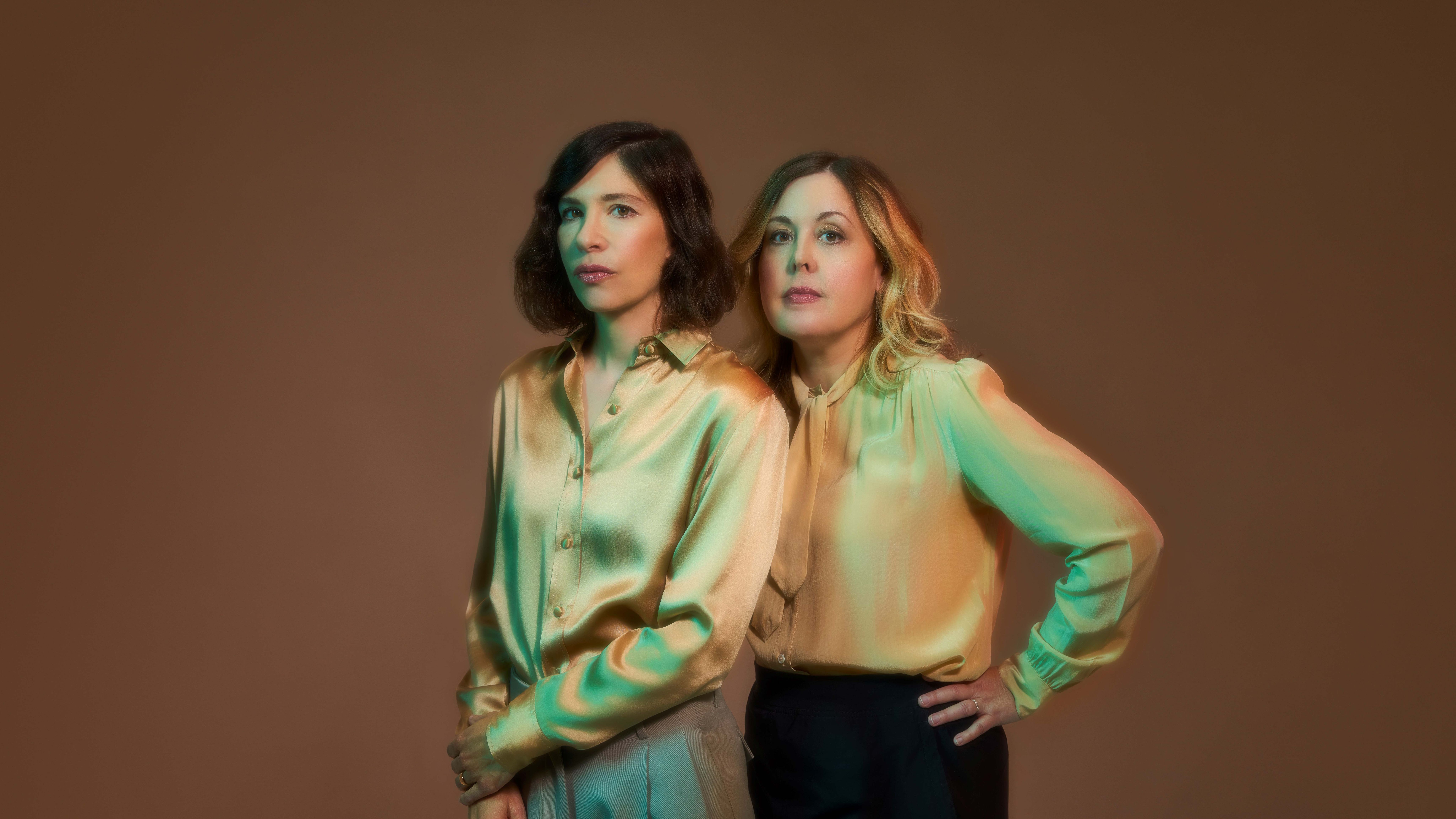 Sleater-Kinney's Carrie Brownstein and Corin Tucker performing live in 2024