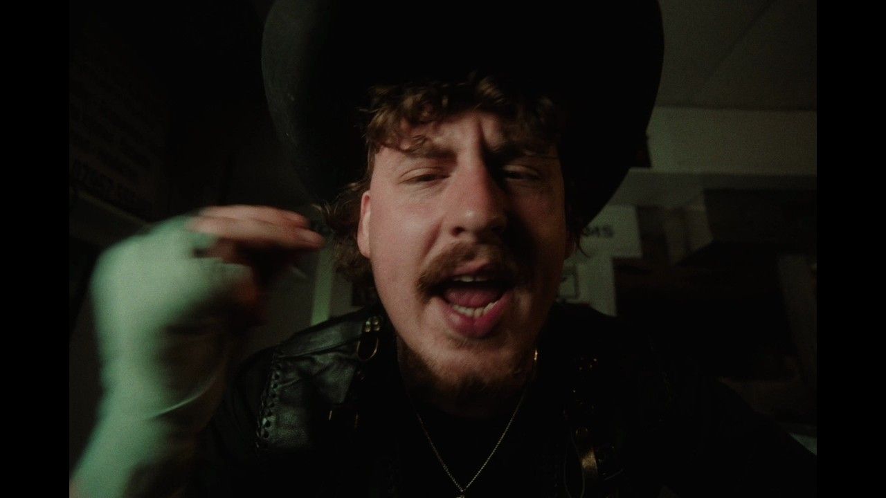 Fat Dog perform inside a wrestling ring in the Go Fuck Urself music video
