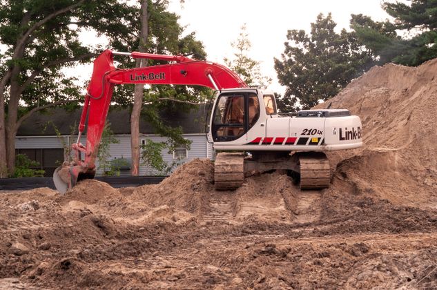 LX series excavator working in dirt