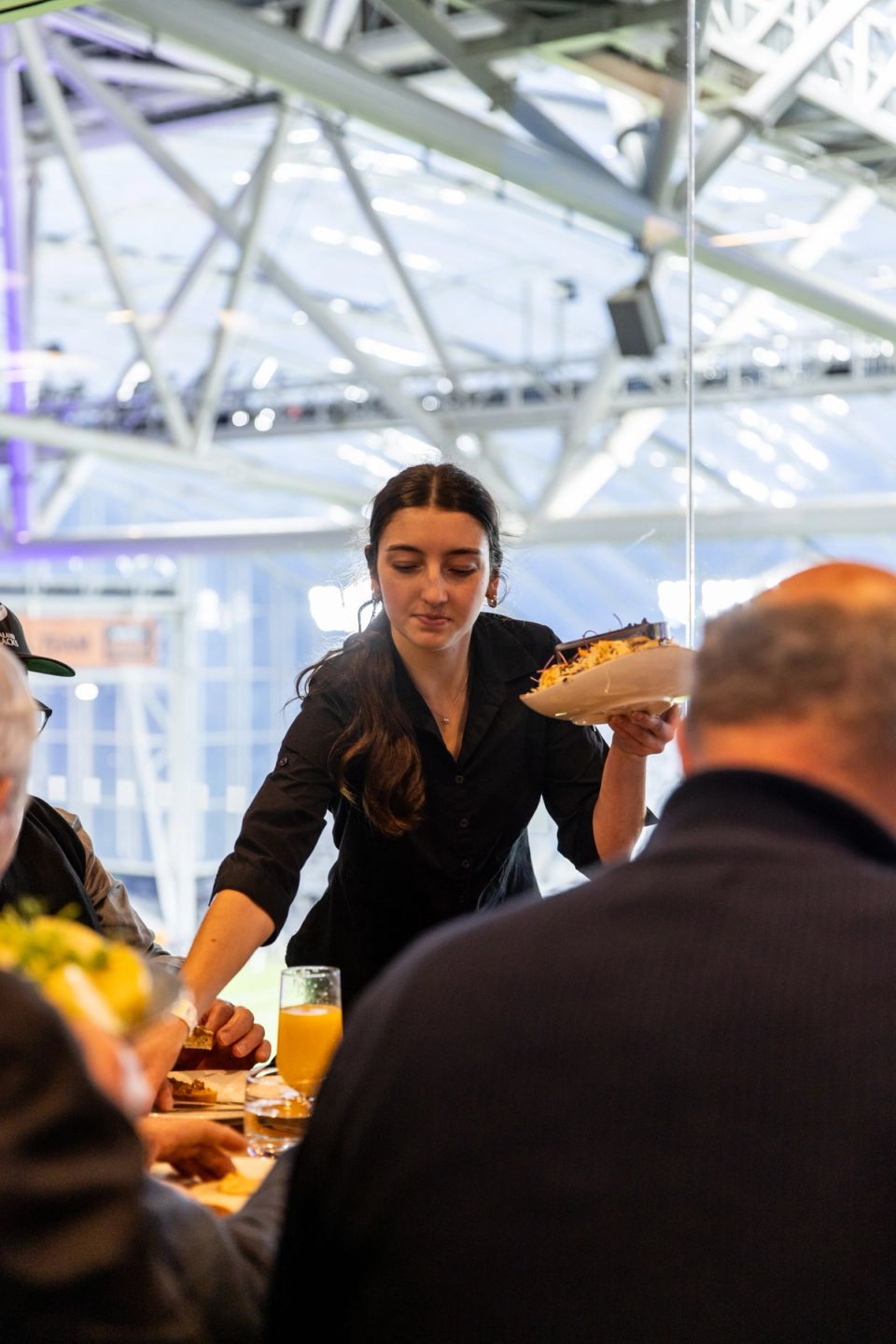 Waitress serving tables