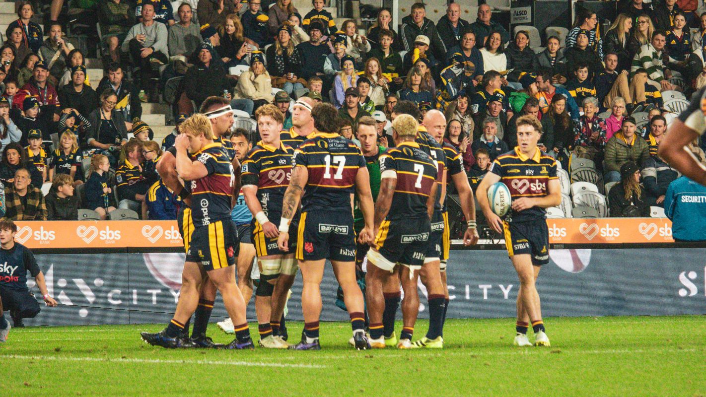 The Highlanders Team Huddle