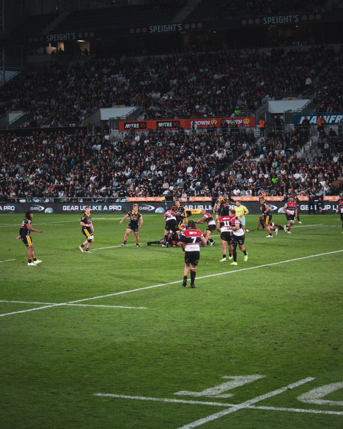 Highlanders v Crusaders in front of a packed Speight's Stand