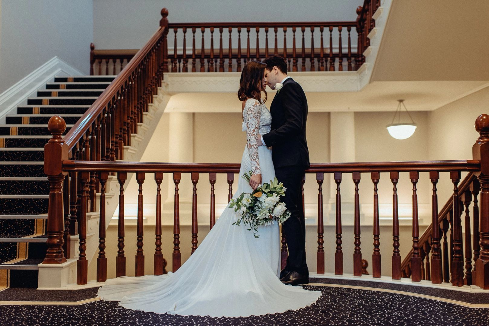 Bride and Groom in historic Dunedin venue for wedding photoshoot - vintage look.