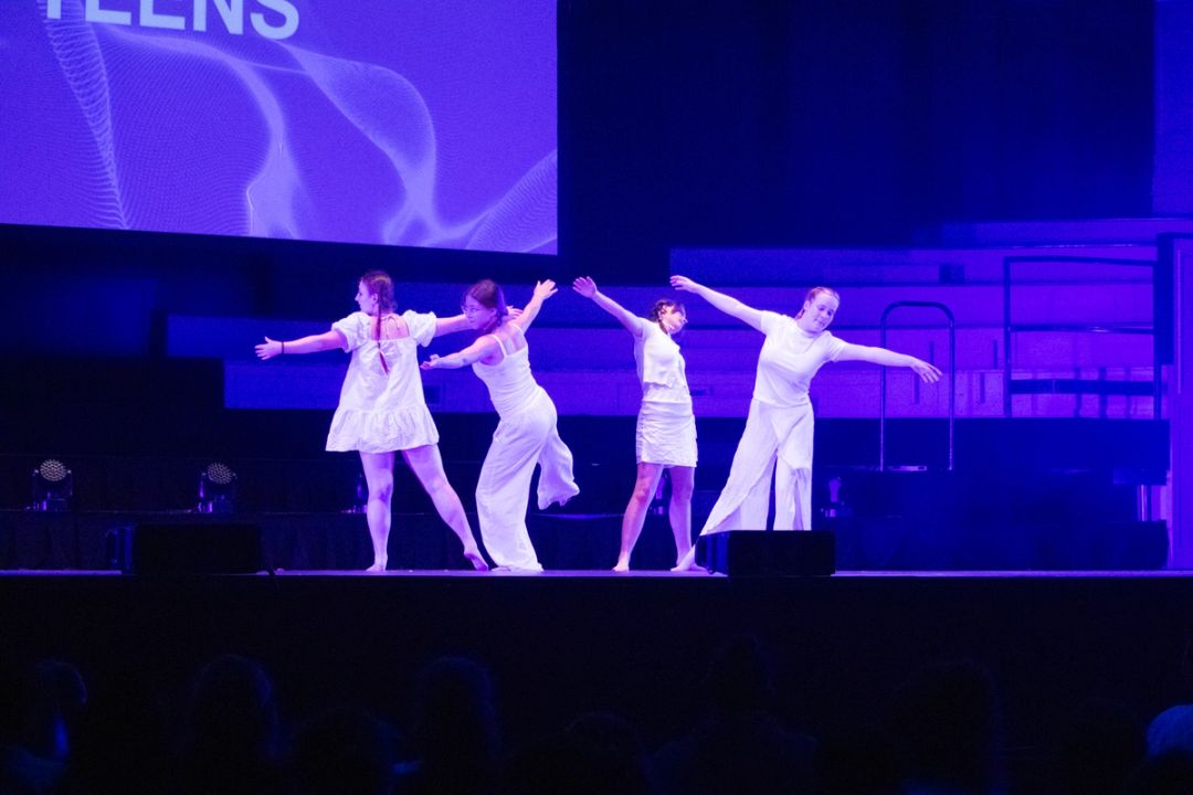 Dancers on stage in the Dunedin Town Hall