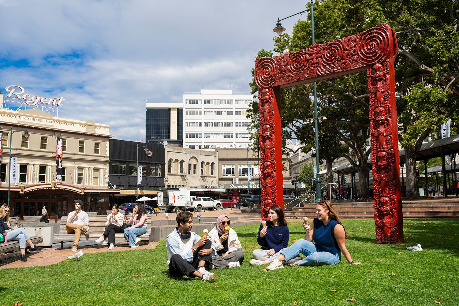 People relaxing in the Octagon in Dunedin