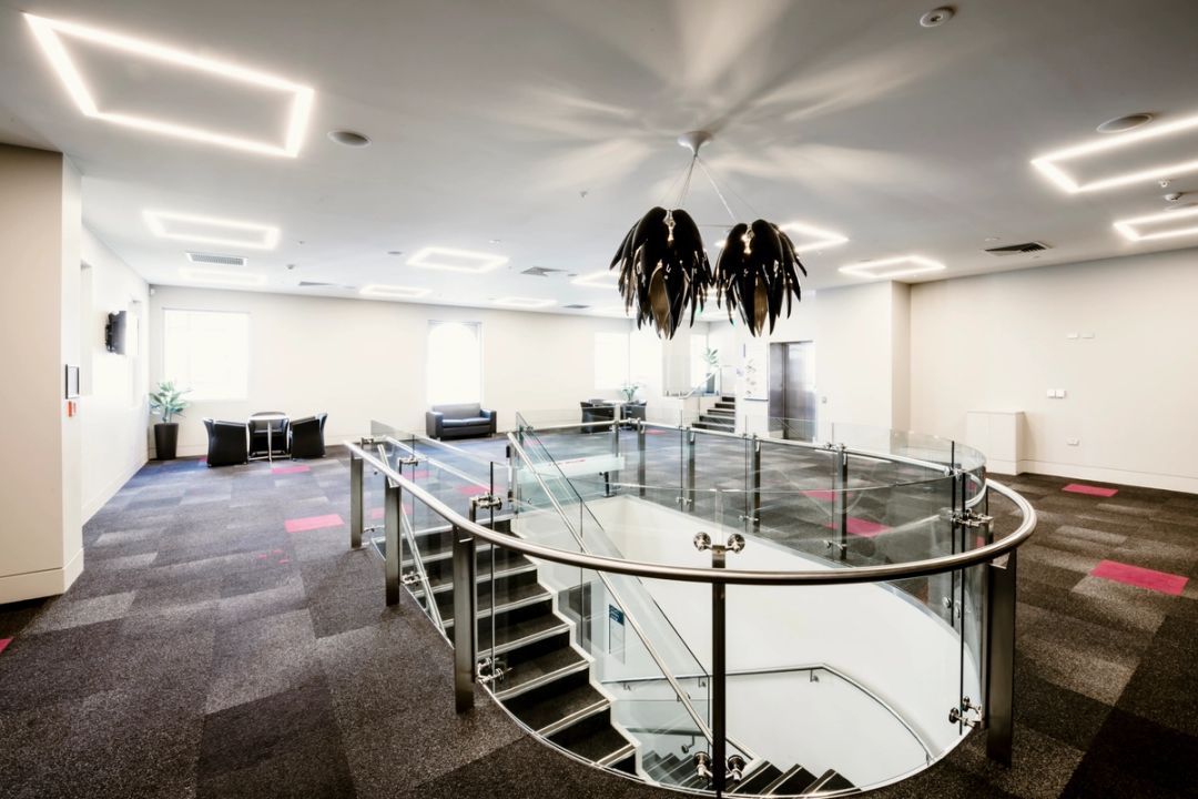Fullwood Foyer with stairs and feature lighting fixture