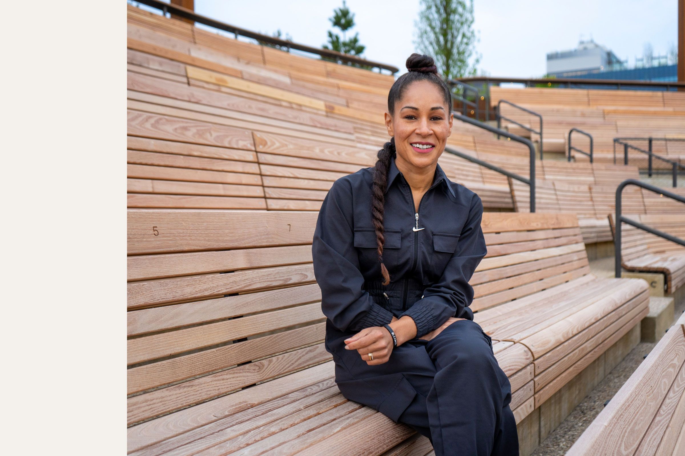 A woman sitting in our wooden amphitheater