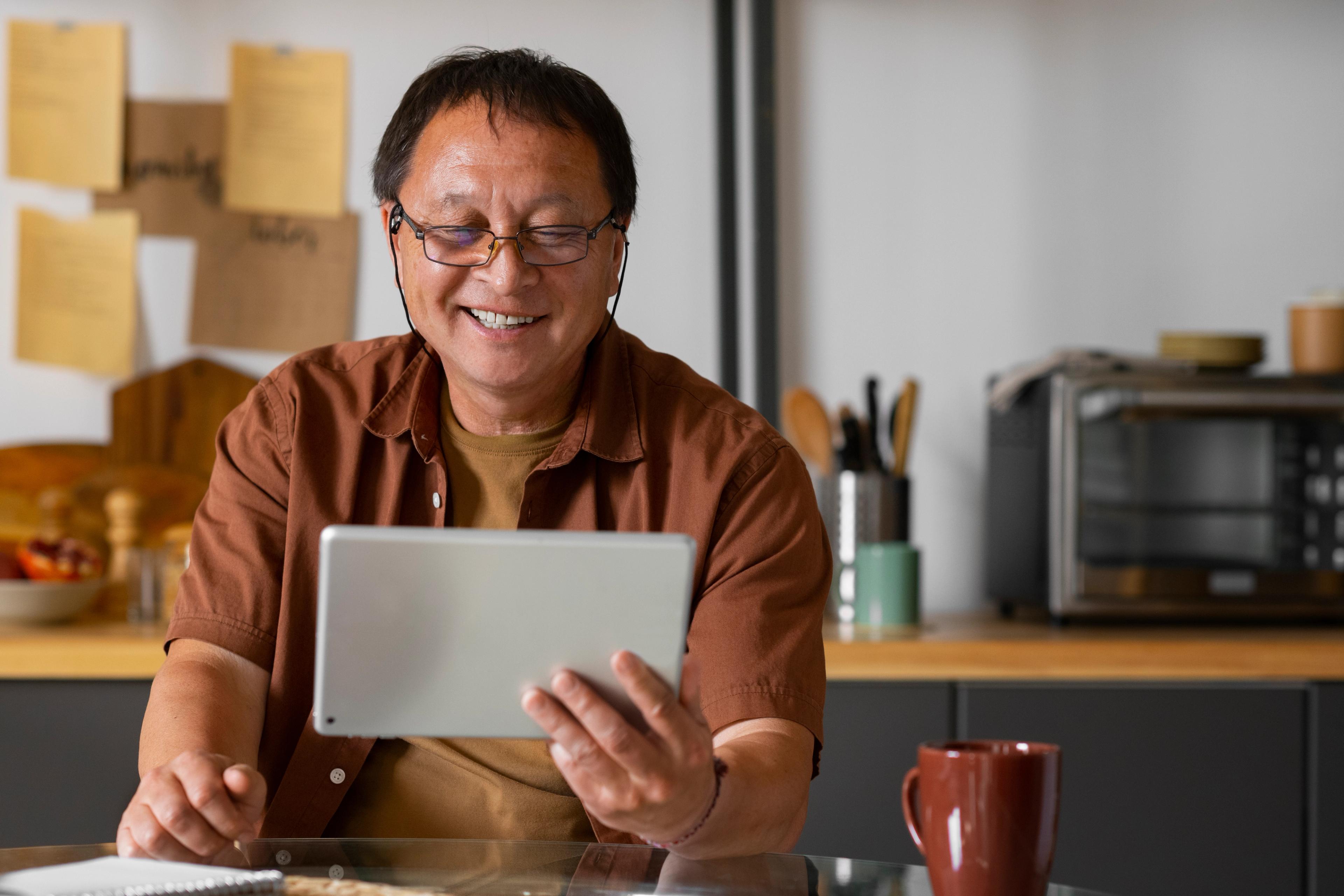 Man using his tablet device
