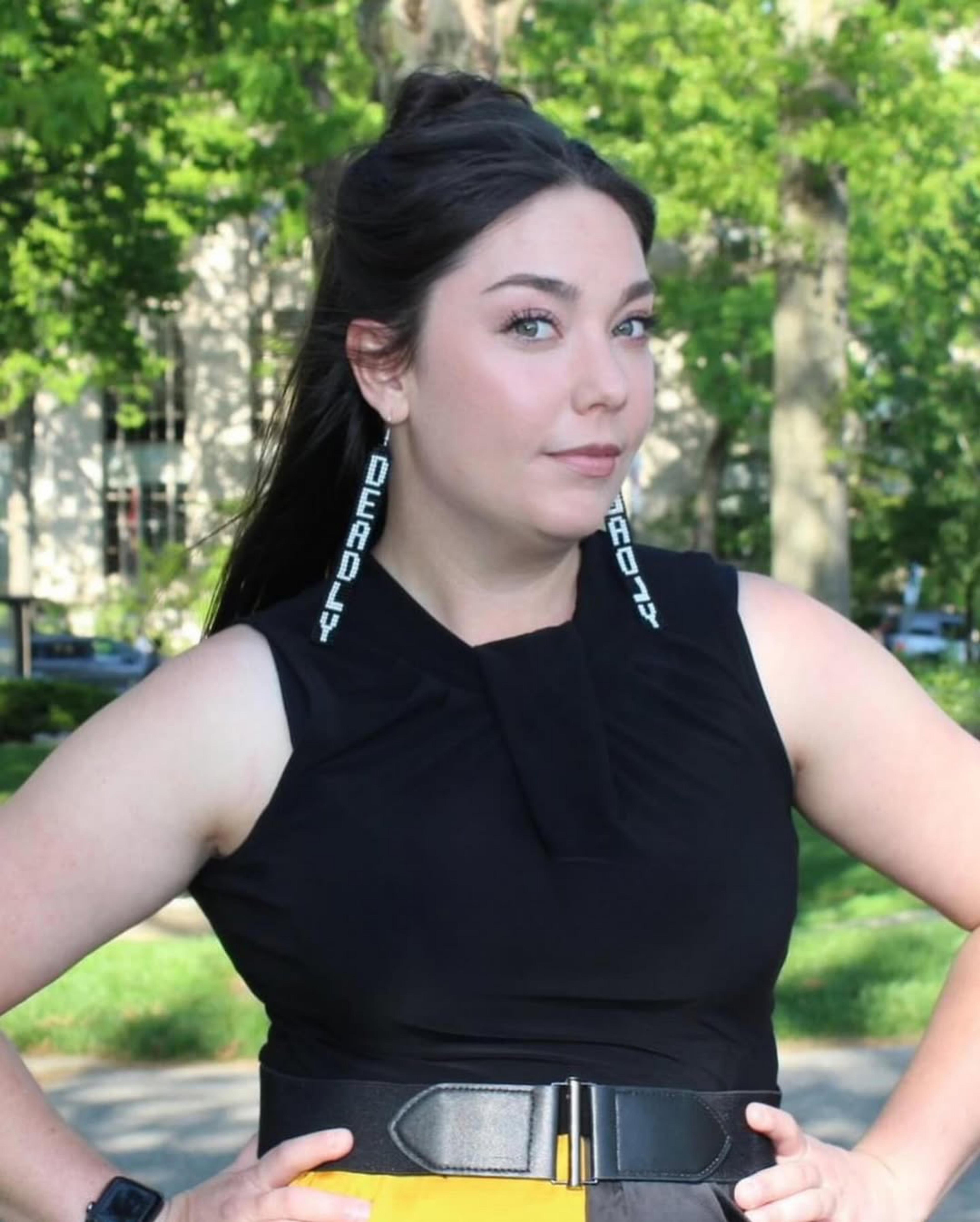 The deadliest earrings around, worn by Amber Buker