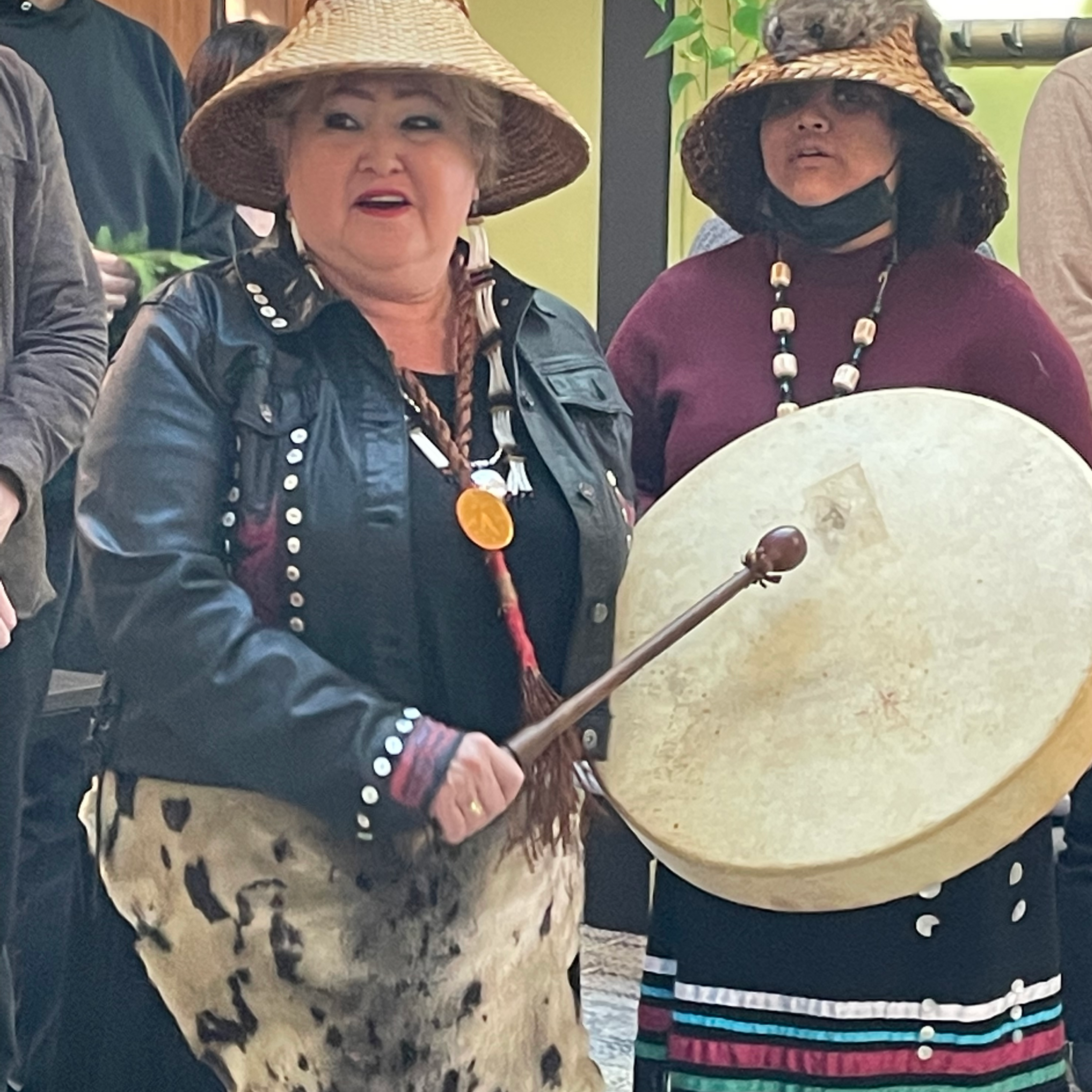 Aunty Jess and Cheyanne at our OneFeather gathering initiating the drum circle
