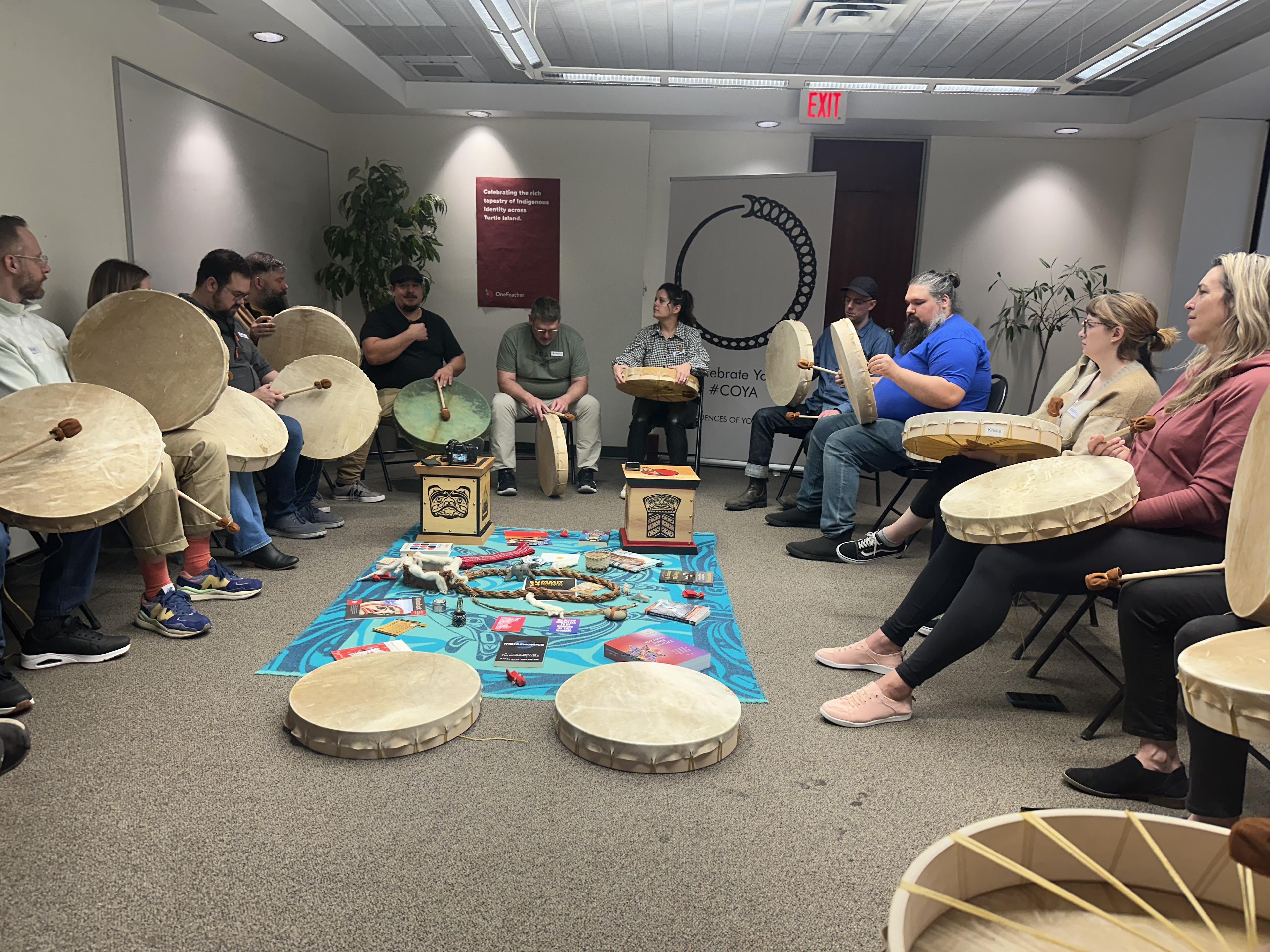 Our team in circle with OneFeather treasures