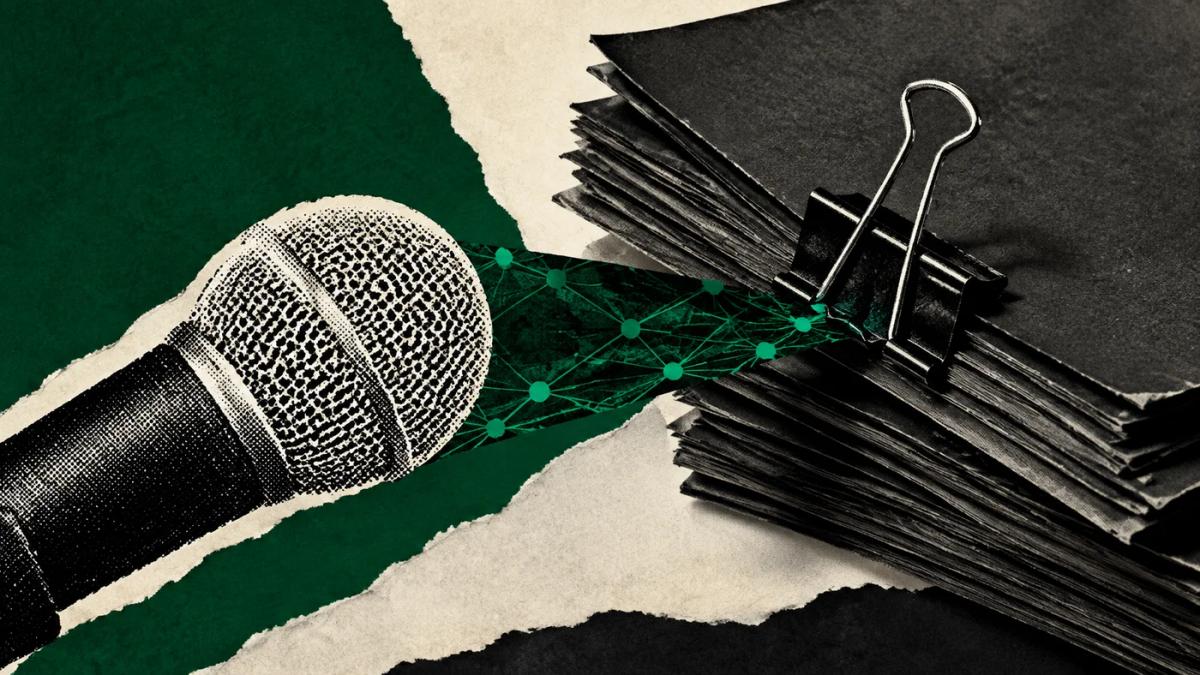 Microphone and papers beside a clamped network ribbon as a metaphor for the blocking debate.