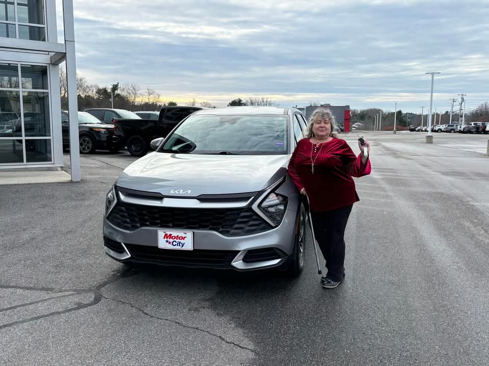 Miki with their 2023 Kia Sportage