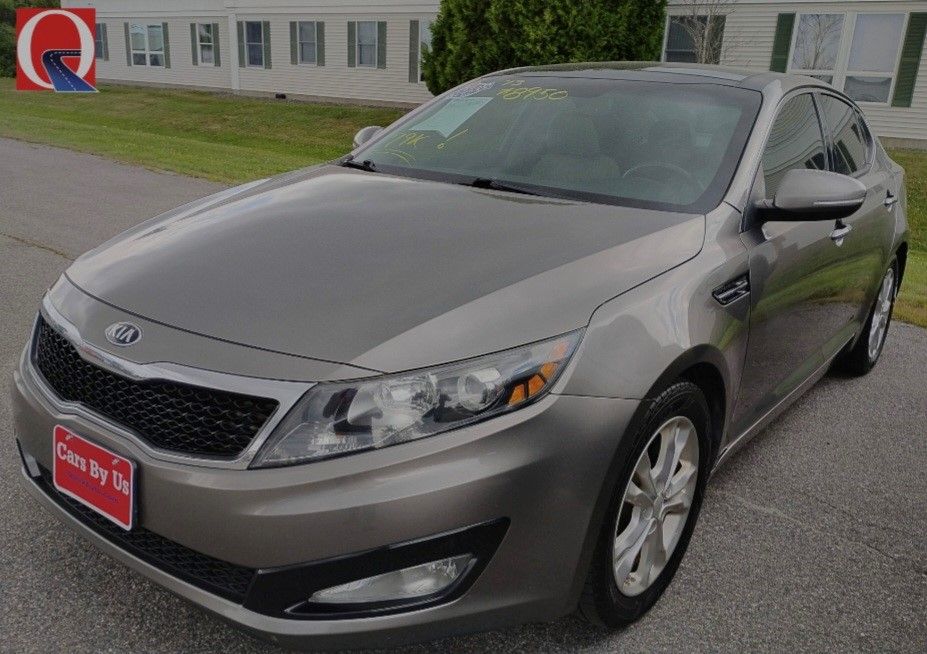Jacob (& Son) with their 2013 Kia Optima EX