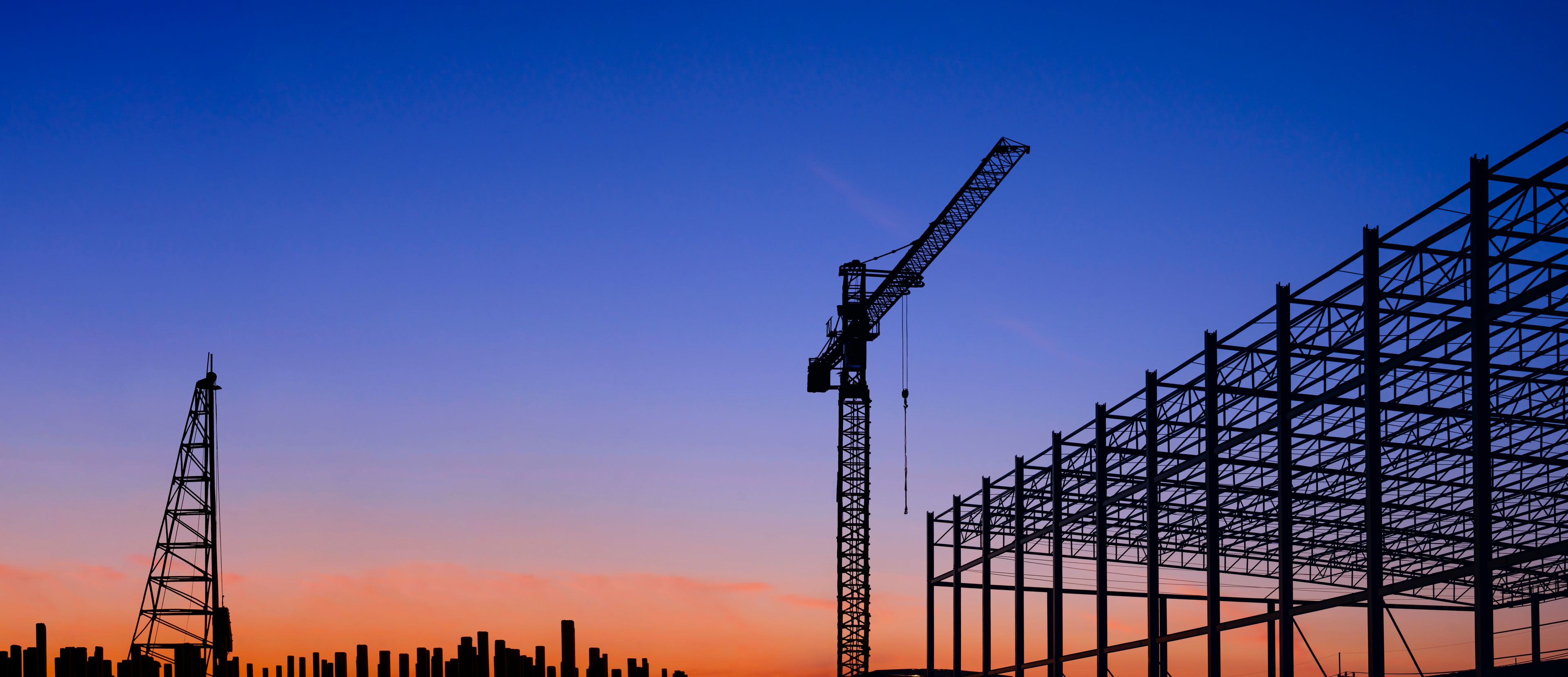 Scaffolding in front of sunset