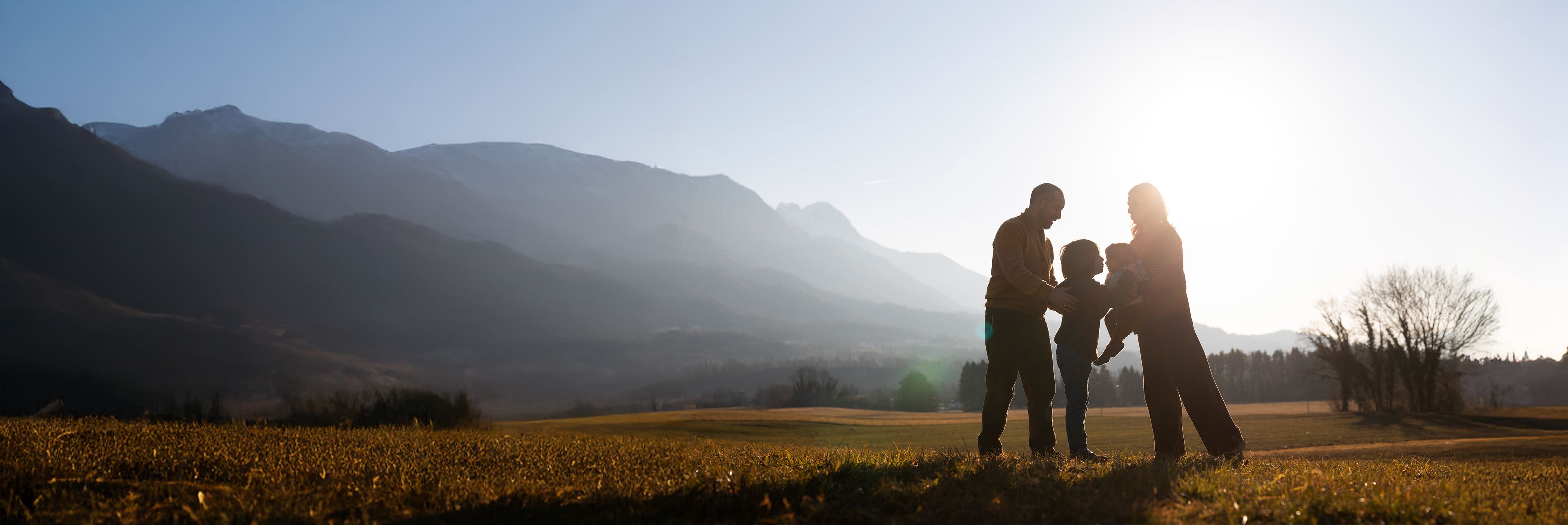 Family in front of mountain