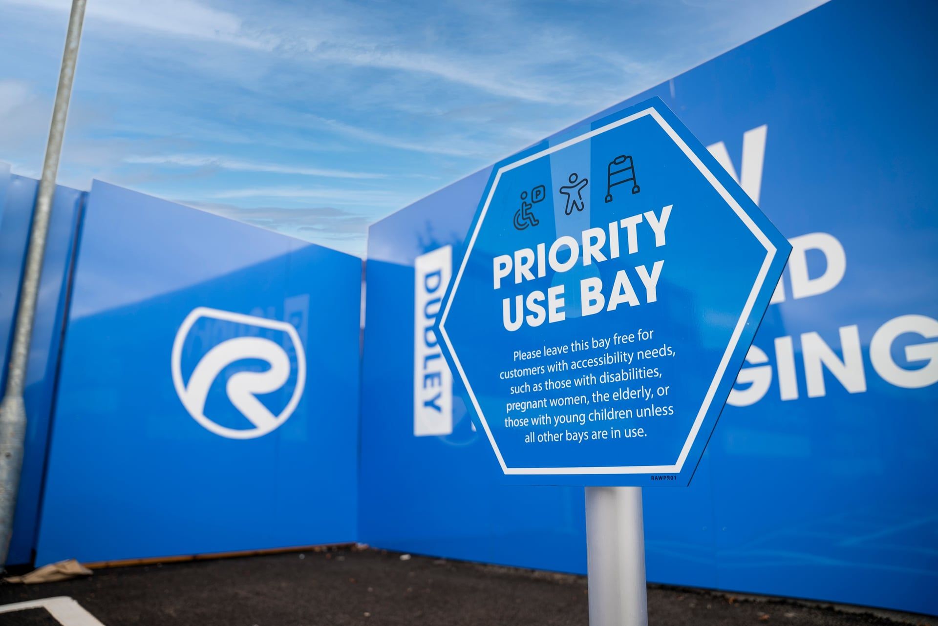 RAW Blue sign that says 'Priority Use Bay'