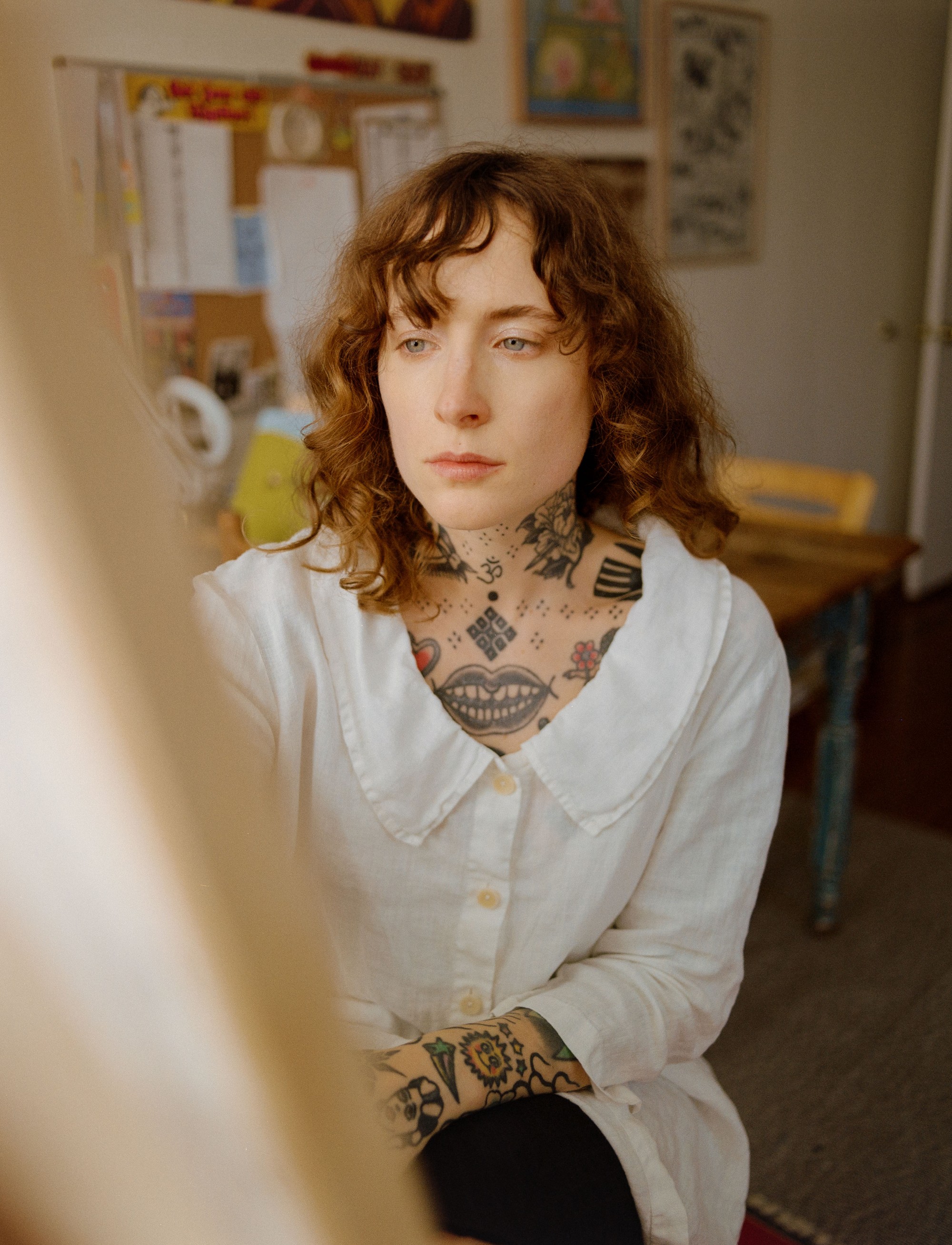 Portrait of Burger Babie artist Addeline Griswold in her Los Angeles studio, shot through foreground blur on medium format film by Nathaniel Perales
