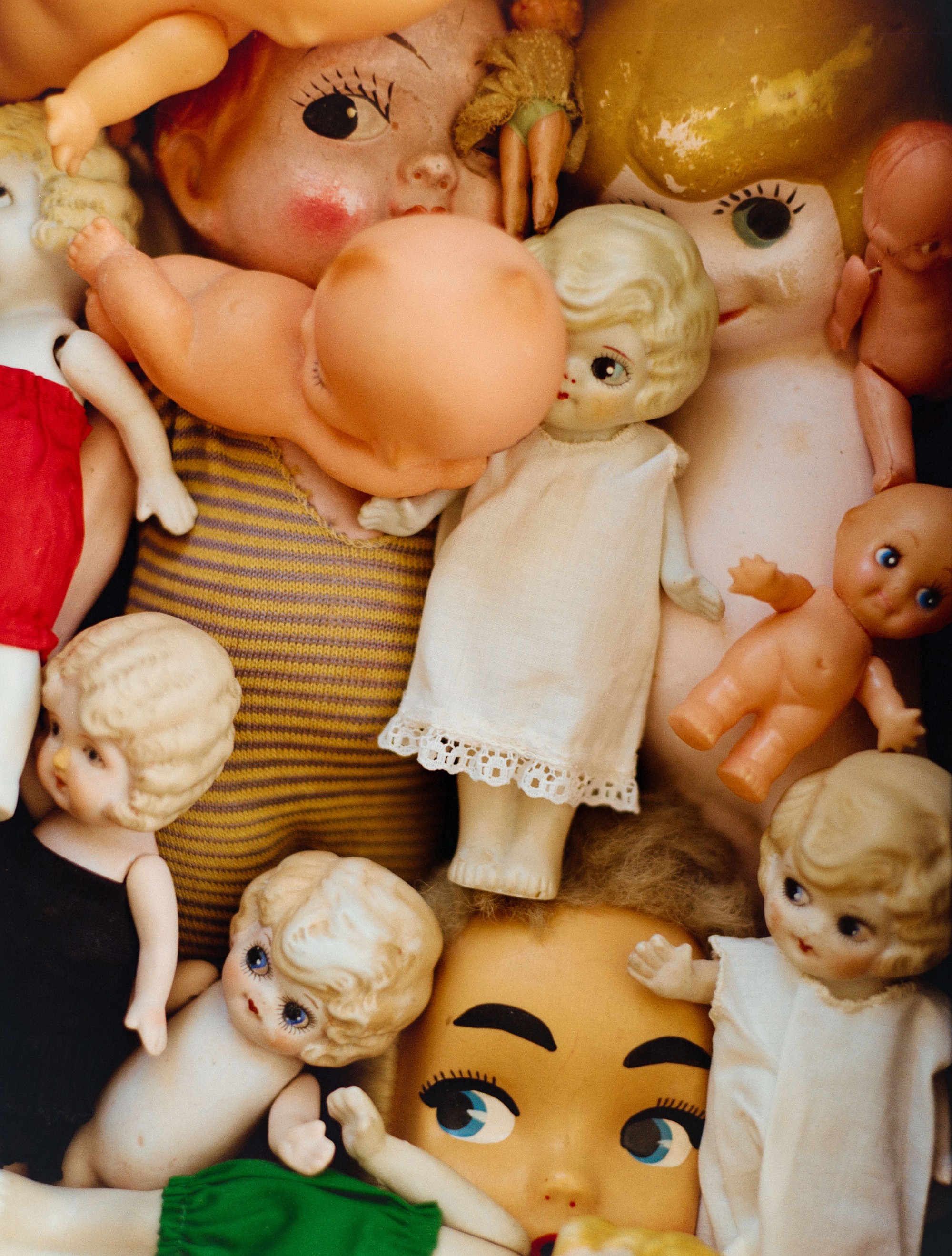 Close-up of Addeline Griswold's vintage doll collection, artist known as Burger Babie, photographed on 120 film in Los Angeles