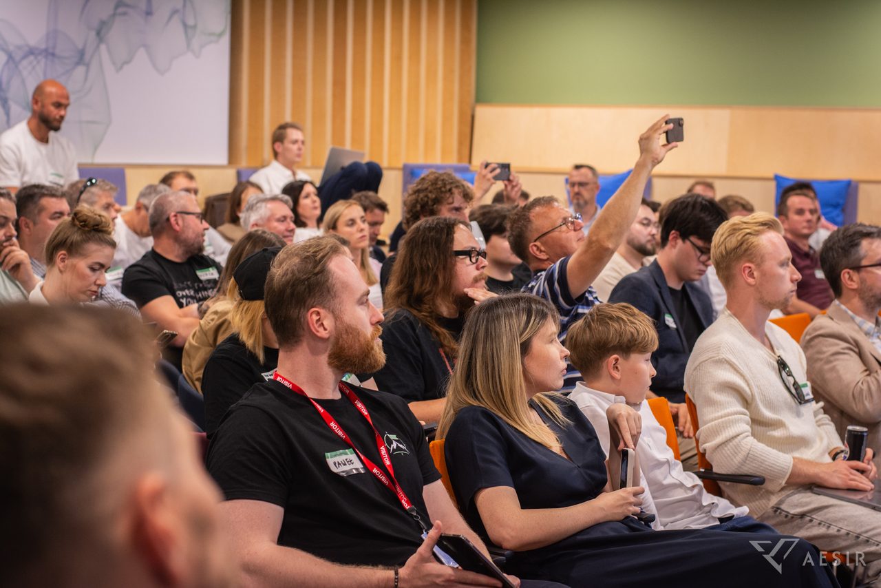 A full room during the second edition of Pionierzy AI at the Kainos space in Gdańsk