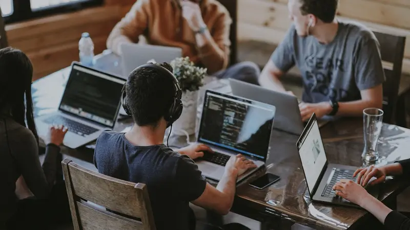 Successful startup team collaborating together