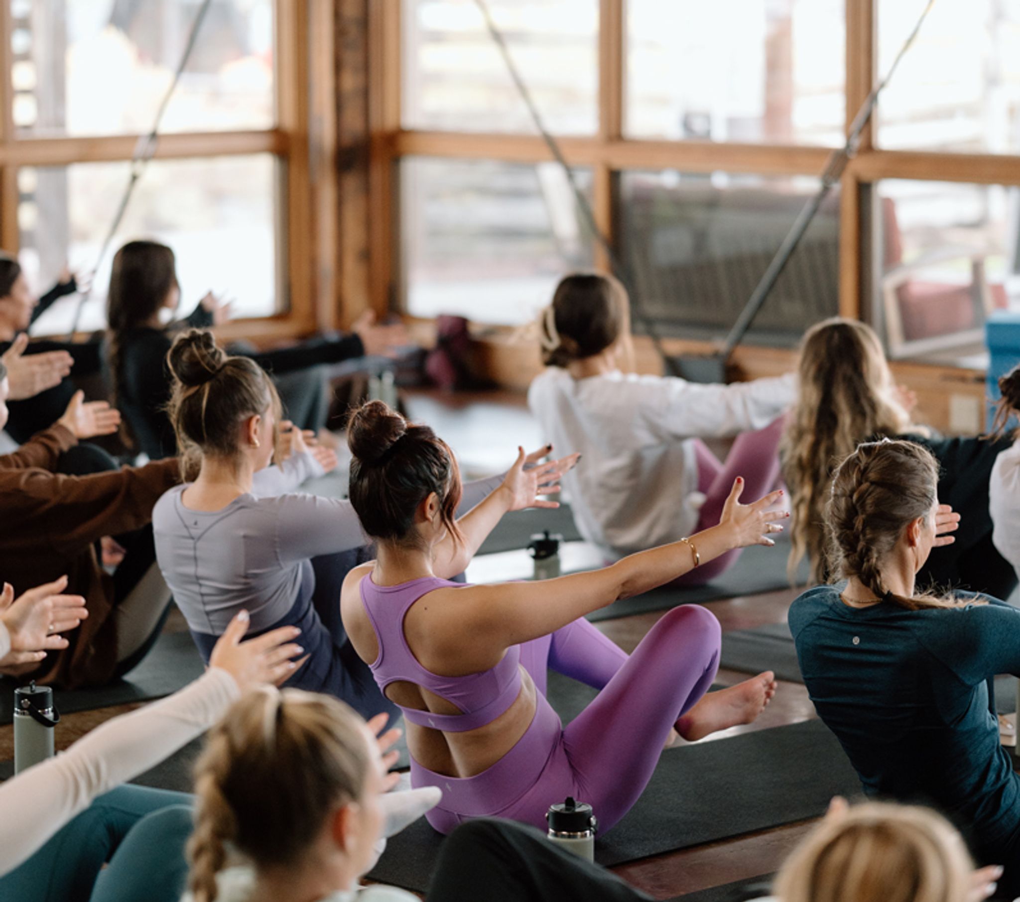 group doing yoga inside