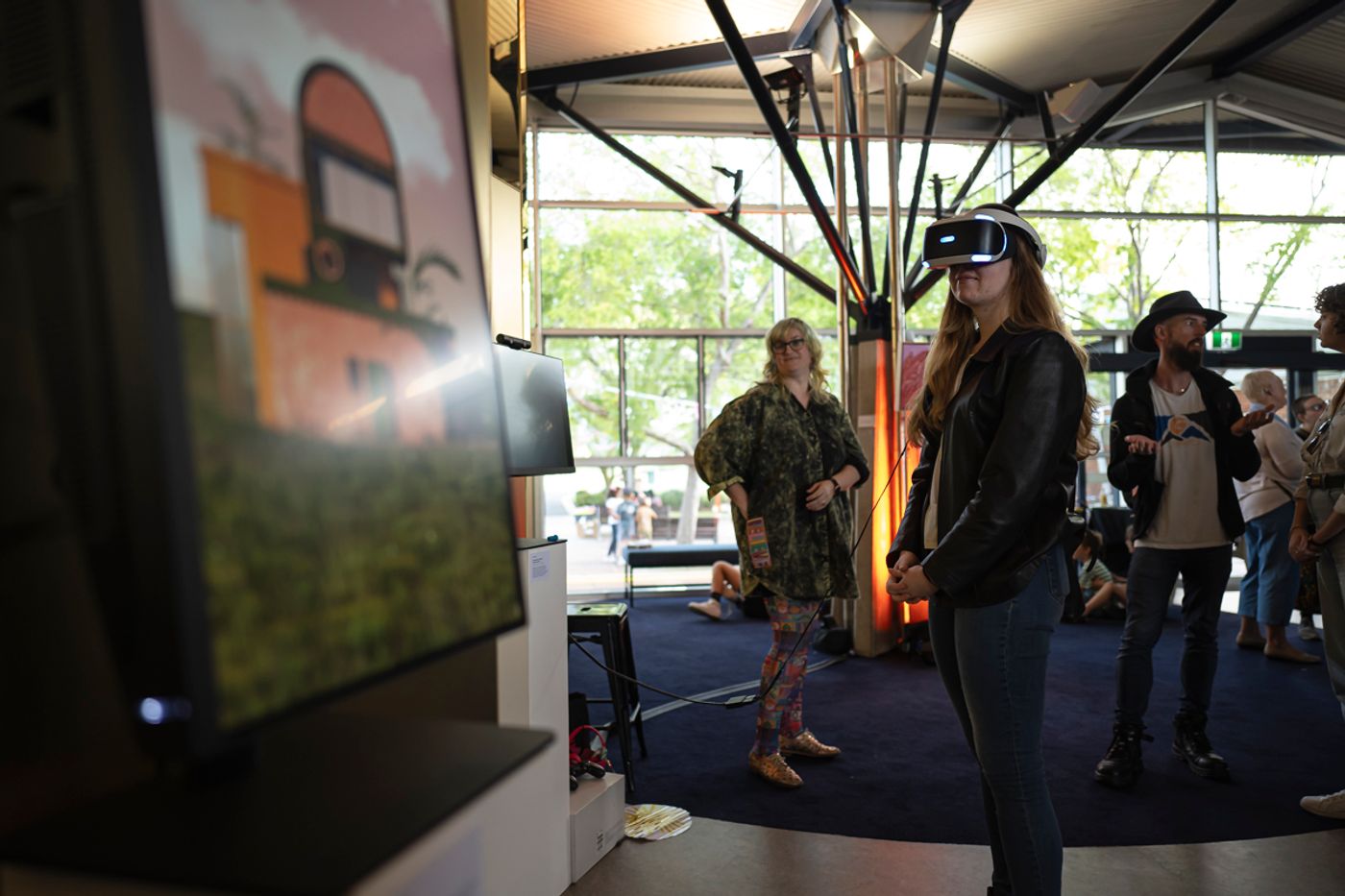 A visitor wearing a VR headset at DARE’s Flow Festival showing. Photo: Kit Edwards