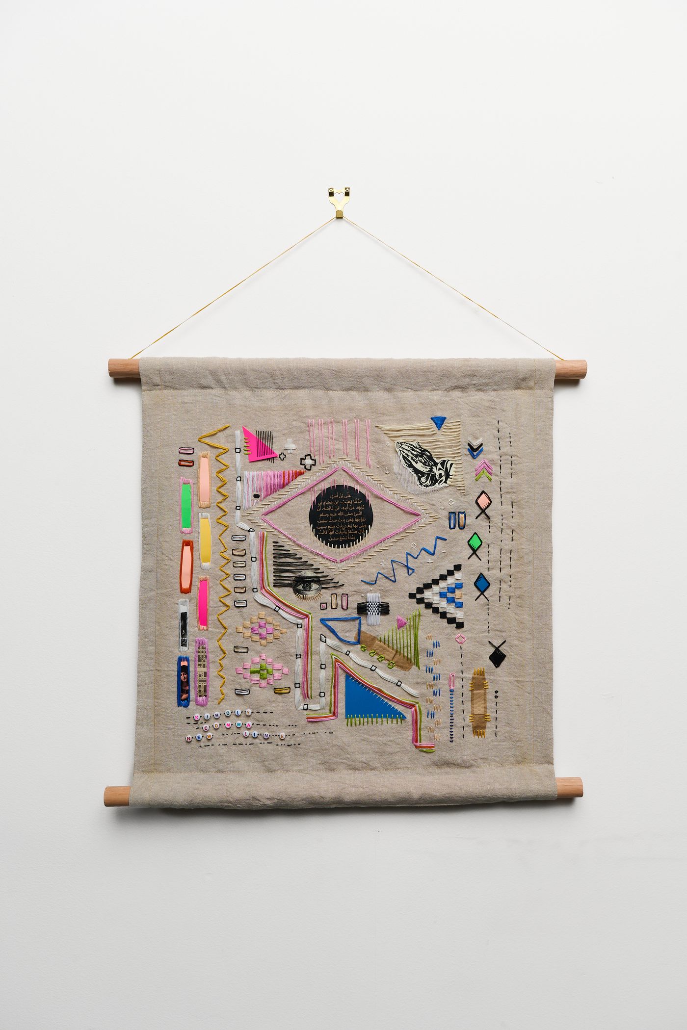 Tabula Rasa Pt 2 — natural linen hanging embroidered with bright signs, symbols and beads