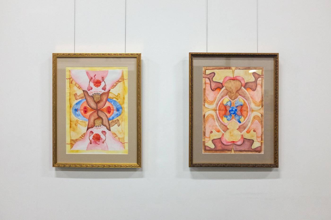 Roots and Fruits Pt. 1 & 2 — two framed symmetrical watercolours in warm earth tones