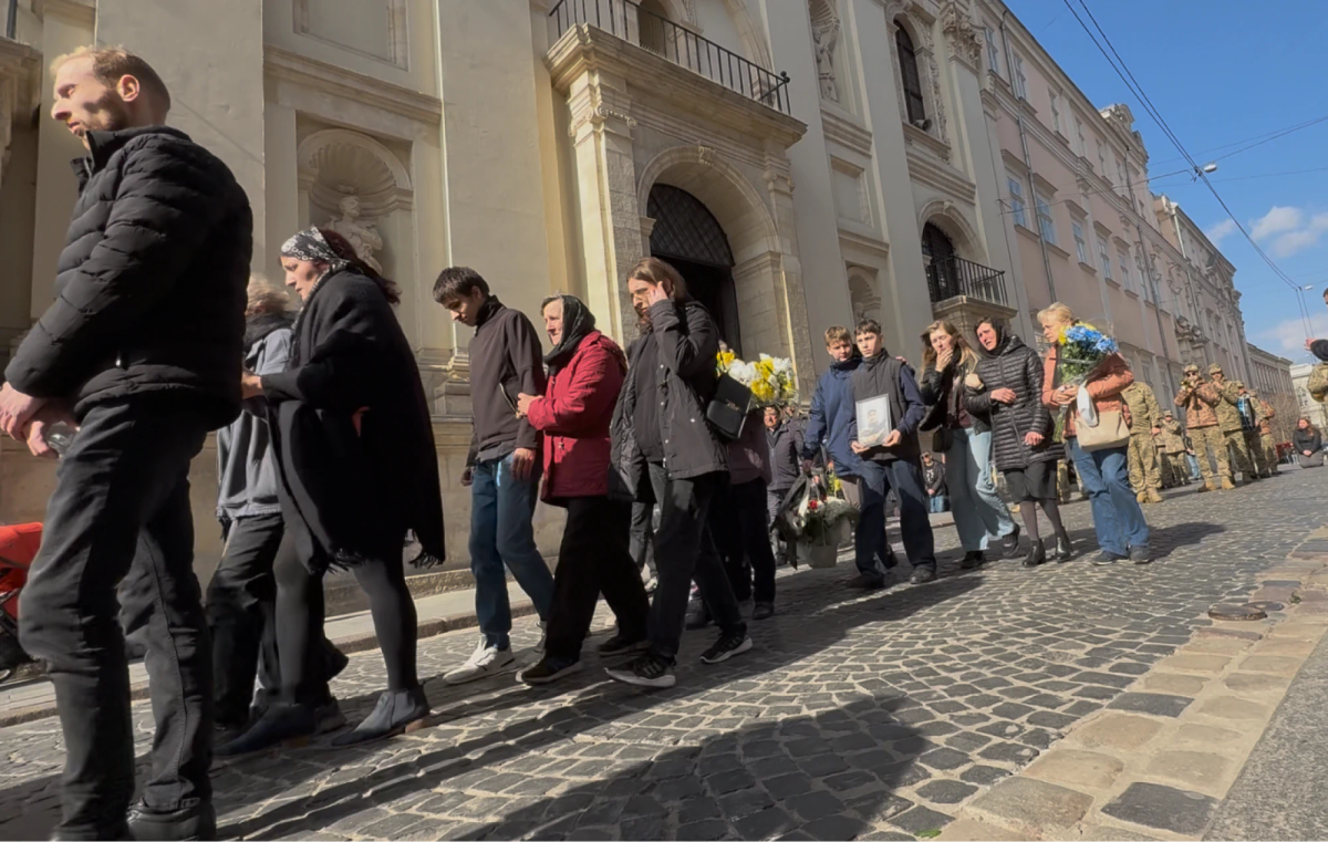 Mourning families at funeral
